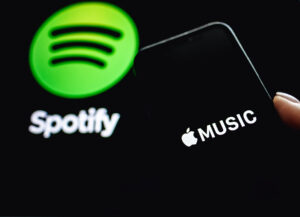 Screen Shot Of Apple Music App And Spotify. Apple Music And Spot